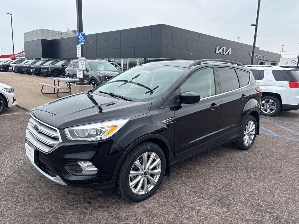 2019 Ford Escape SEL in Black Metallic — front three-quarter view