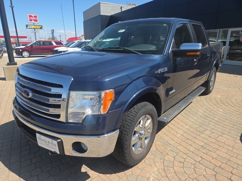 2014 Ford F-150 Lariat in Blue — front three-quarter view