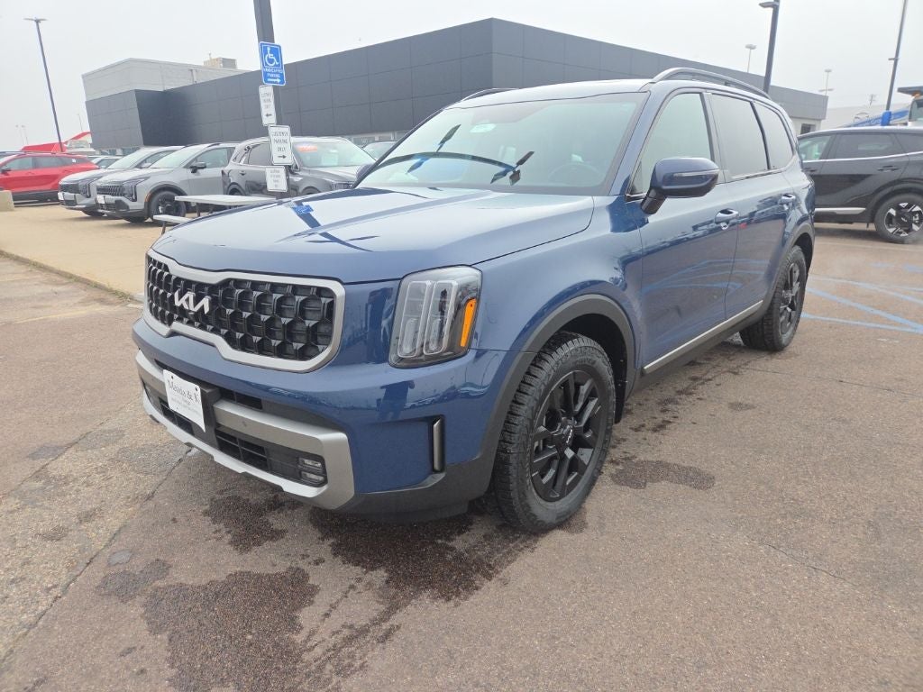 2023 Kia Telluride SX X-Pro in Midnight Lake Blue — front three-quarter view