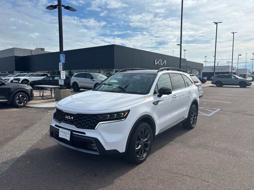 2023 Kia Sorento X-Line SX Prestige in Glacial White Pearl — front three-quarter view