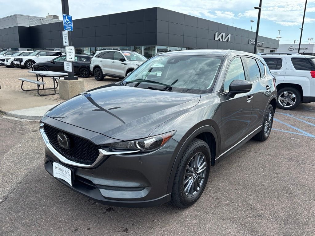 2019 Mazda Mazda CX-5 Touring in Machine Gray Metallic — front three-quarter view