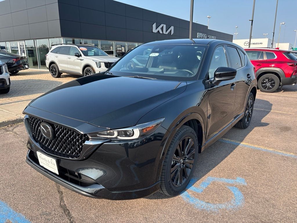 2024 Mazda Mazda CX-5 2.5 Turbo Premium in Jet Black Mica — front three-quarter view