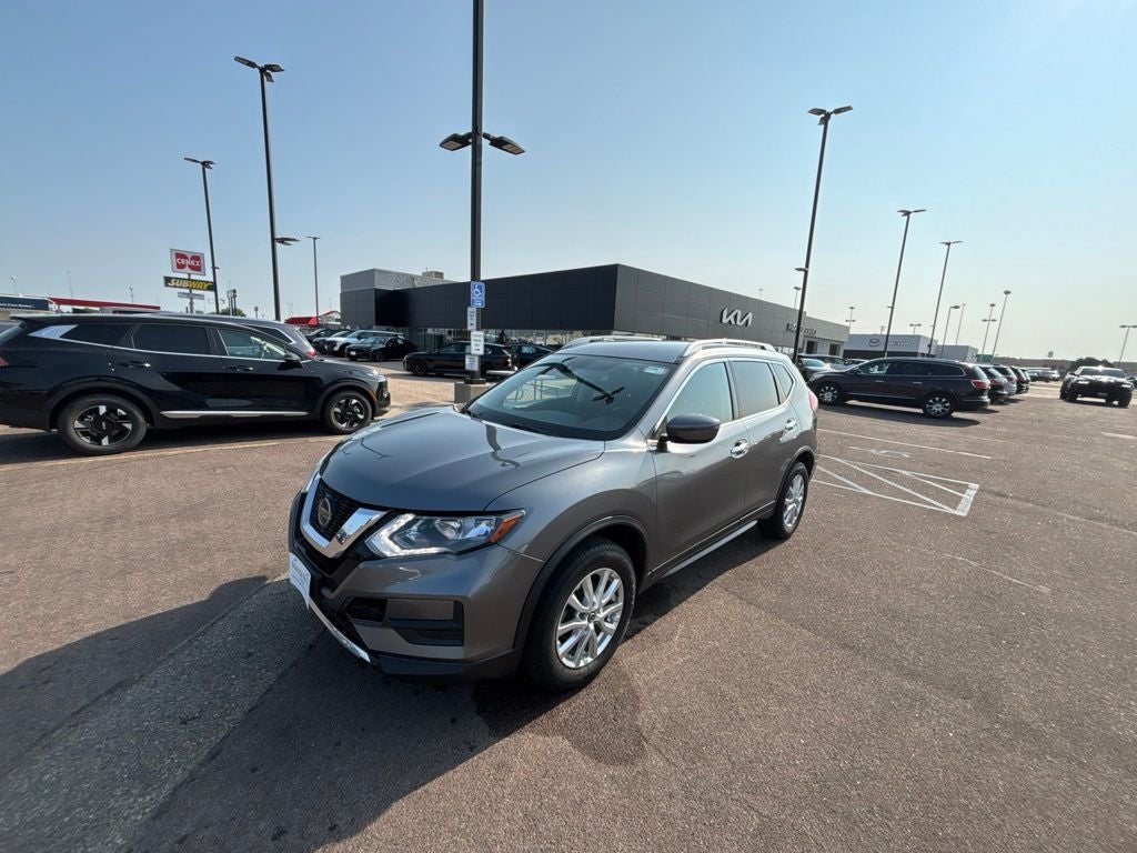 2020 Nissan Rogue SV in Gun Metallic — front three-quarter view