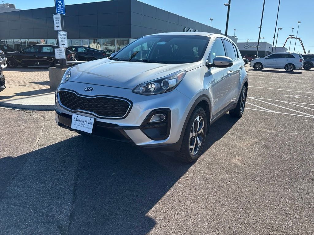 2021 Kia Sportage LX in Sparkling Silver — front three-quarter view